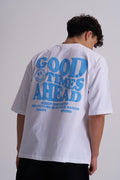 Male wearing a white t-shirt with blue text 'GOOD TIMES AHEAD' on the back against a plain background