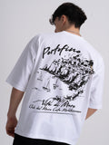 Male wearing a white t-shirt with black coastal line drawing and Portofino text on the back