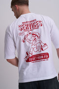 White t-shirt with red cartoon man holding a tool kit graphic and maintenance services text on a plain background